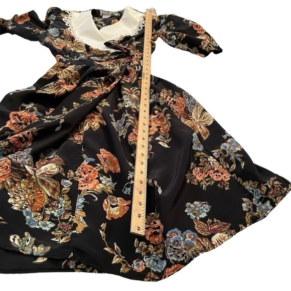 Vintage Floral Shoulder Pad Casual - 1/2 Wrap
Midi Dress
Uni Mondo - Size 12 - Picture 8 of 11